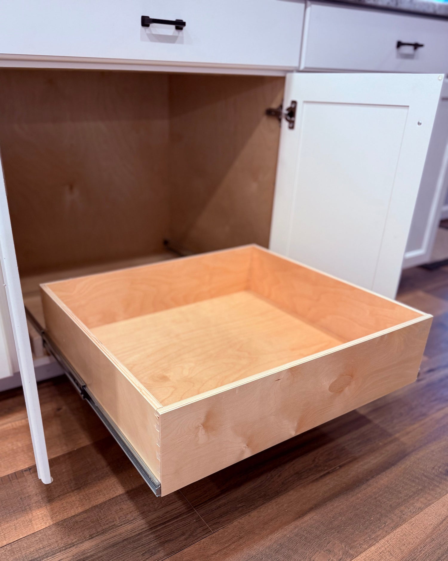 Slide out drawer for cabinet